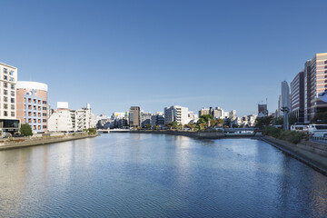 Fototapeta na wymiar 博多、灘の川橋から見た中州方面の景色