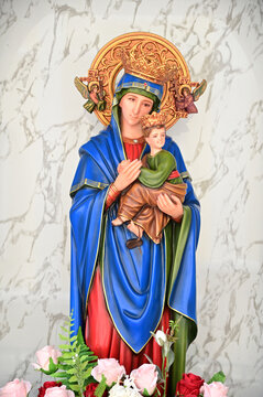 Closeup of Our lady of perpetual help statue virgin Mary with Child Jesus in the church, Thailand. selective focus.