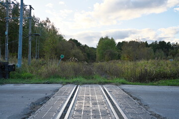 Hokkaido, Japan - October 11, 2023: Ikutora railroad crossing on deserted railway of Nemuro Line in Hokkaido, Japan
 - obrazy, fototapety, plakaty