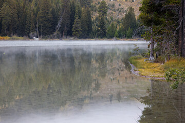 String Lake in Grand Teton National Park with reflections and steam during early fall