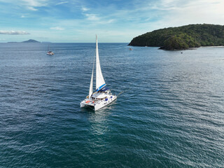 Aerial view of a catamaran on the andaman seas. Sailing in Phuket, Thailand.