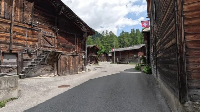 An old historical village in Switzerland. OBERWALD in Goms with old cabins and cottages