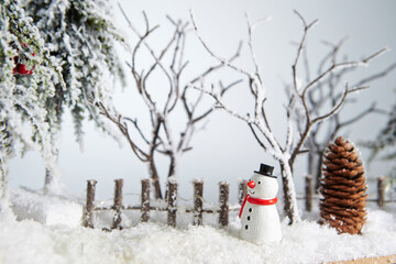 snowman with christmas tree
