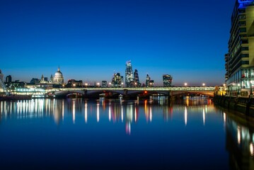 Fototapeta na wymiar Beautiful view of London, England from the banks of the River Thames during the blue hour