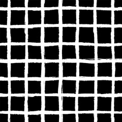 White Naive Checkered seamless pattern on Black. Messy graffiti sketch wallpaper print in grunge style with trippy grid. Swiss design aesthetic with dry&nbsp;brush&nbsp;textures. Simple&nbsp;geometric&nbsp;print.
