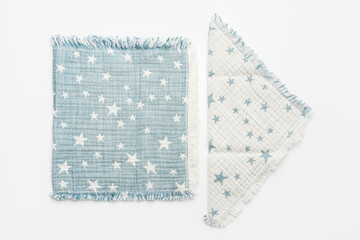 Muslin blanket with star pattern on white background