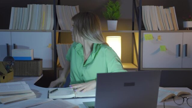 Researcher woman and her library.