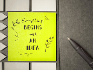 Inspirational and motivational concept - everything begins with an idea on paper background.