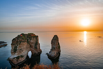 Obraz premium Sunset over The Pigeon Rocks also known as Raouche in Beirut, capital of Lebanon