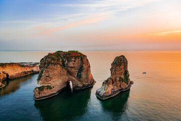 Naklejka premium Sunset over The Pigeon Rocks also known as Raouche in Beirut, capital of Lebanon