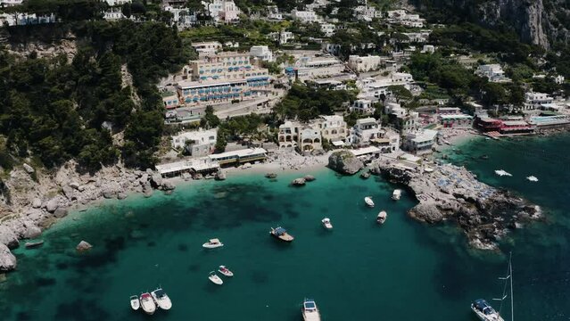 Aerial view pulling away from Marina Piccola in Capri, Italy.