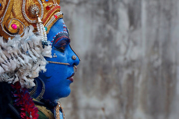 costume of lord Durga transforms into Goddess Kali during a hindu religion local festival kali puja