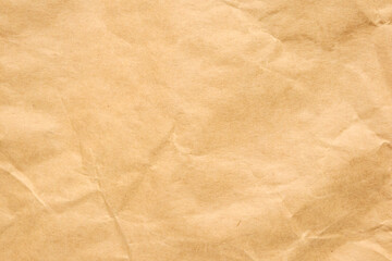 Abstract crumpled and creased recycle brown paper texture background