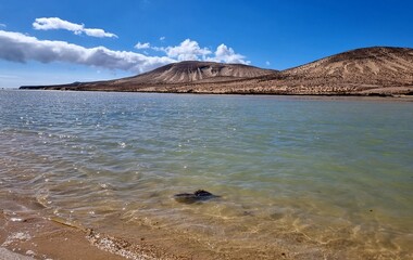 Lake by the ocean on the beach on the Spanish island of Fuerteventura