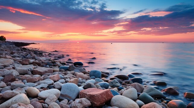 Ethereal Sunset Over Pebbled Shoreline