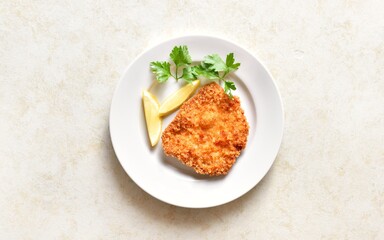 Homemade breaded chicken schnitzel