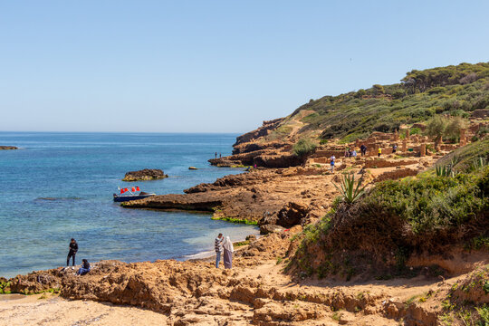 Tpaza, Tipasa, Algeria, 10 22 2023 : Ruins of the Roman Archeological Park of Tipaza. Tourists on the site.