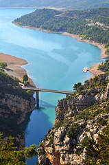The turquoise blue Lake Lac de Sainte-Croix in the south of France in the Provence region. Water...