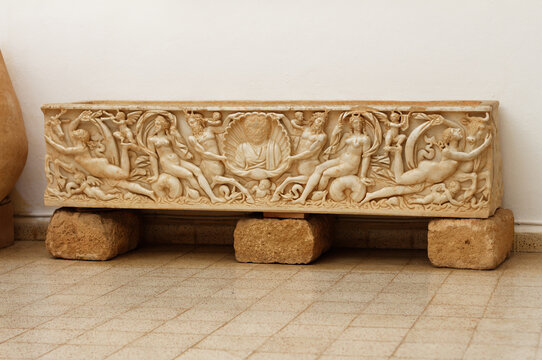 Tipaza, Tipasa, Algeria, 10 25 2023 : beautiful Roman marble sarcophagus on display in the Archaelogical Museum. It's decorated with centaurs and nymphs.