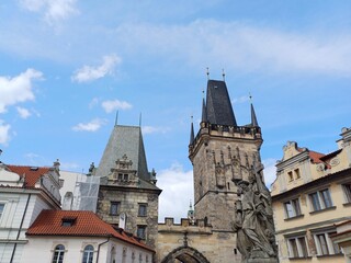 Fototapeta na wymiar Lesser Town Bridge Tower (or Mala Strana Bridge Tower) in Prague city, Czech Republic. The tower serves as the entrance to Lesser town from the Charles Bridge