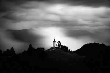 St.Primoz church ,Jamnik, Slovenia - moody black and white photo - obrazy, fototapety, plakaty
