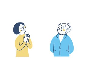 上の方を見ながら喜ぶシニアカップル