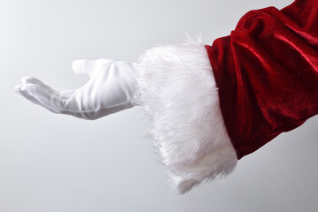Santa claus hand making gesture offering isolated white - obrazy, fototapety, plakaty