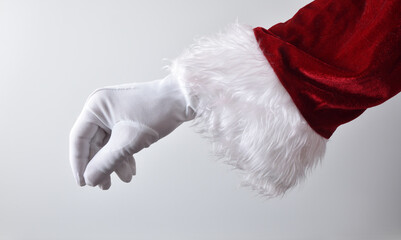 Santa claus hand making gesture of catching something isolated white - obrazy, fototapety, plakaty