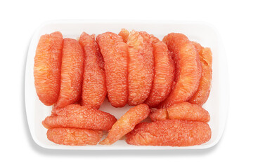 Fresh pealed pomelo fruit on white plastic tray with clipping path, top view