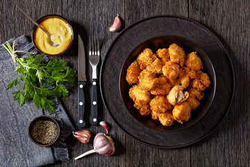 crispy fried panko breaded chicken bites in bowl