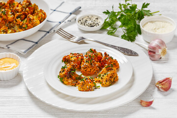 bang bang broccoli bites on plate, top view
