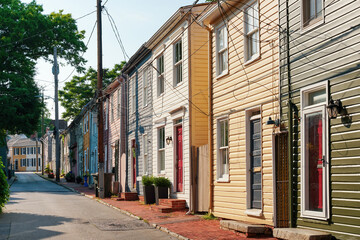 Colorful wooden townhouses in historic downtown Annapolis, Maryland, USA. Typical picturesque architecture in the capital city of Maryland.