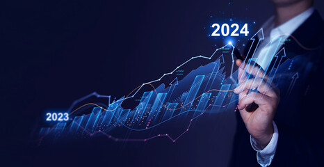 Businessman draws increase arrow graph corporate future growth year 2023 to 2024. New Goals, Plans...