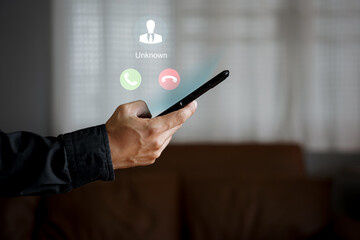 Unknown number calling in the middle of the night. Phone call from stranger. Man answering to incoming call. Phone call from unknown number. Call center gang, scammer or stranger.