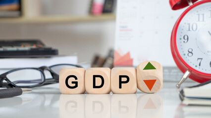 Word 'GDP' on block, UP and Down arrow symbol icon. Concepts of Gross domestic product, Financial,...