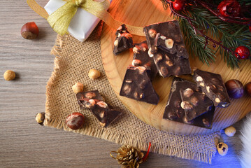 Table with chocolate sweets with hazelnuts as a Christmas snack