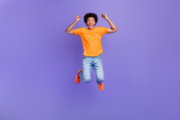 Full body photo of crazy soccer student guy fan support his favorite team championship jumping...