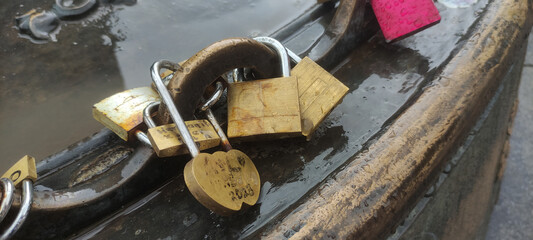 love padlocks tied to the bridge