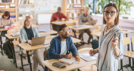 Grown Up Men and Women Getting Self-Improvement Course in College. Adult Class Writing Down Notes...