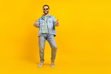 Full body length photo cadre of cool funky hipster man wear sunglass direct fingers you dude invitation isolated on yellow color background