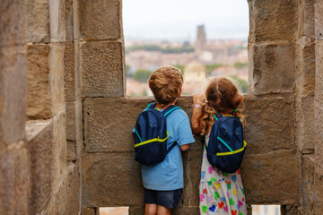 Young tourists wandering around at French fortress, Carcassonne