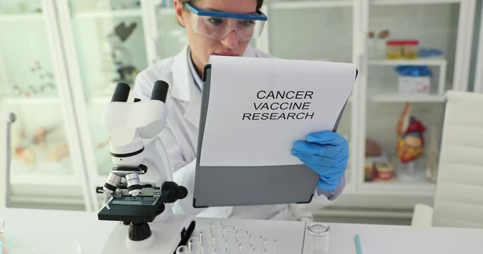 Scientist studies effect of vaccines and cancer in laboratory. Oncology research in the laboratory