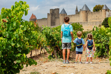 Young explorers ready for Carcassonne castle medieval adventure