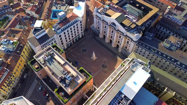Aerial view of the Borsa Piazza Affari. Krishi houses in the city. Attractions for tourists. A crisis. Statue of the middle finger on the hand. Finance. Architecture. Italy, Milan, 11.11.2023