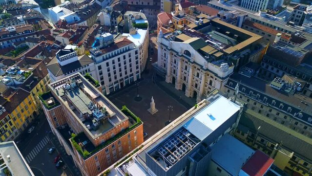 Aerial view of the Borsa Piazza Affari. Krishi houses in the city. Attractions for tourists. A crisis. Statue of the middle finger on the hand. Finance. Architecture. Italy, Milan, 10.2023