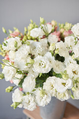 Bunches of flowers white eustoma in vases. Lovely Vintage background with flowers. Wallpapers