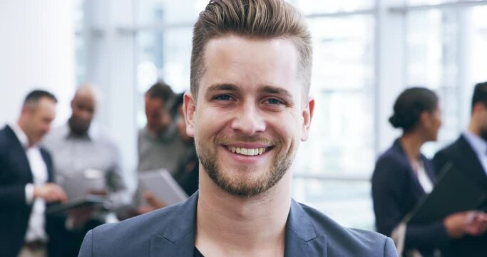 Face, happy and a business man at an office conference for training, company or upskill development. Portrait, smile and workshop with a young employee in the workplace for a meeting or convention