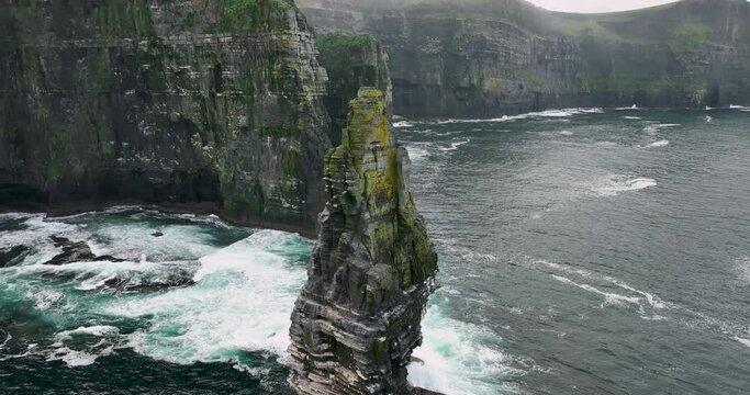 Flying over the Branaunmore sea stack of the Cliffs of Moher 4k