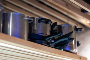 Iron pots on a kitchen - cafe or reustarant