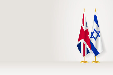 Flags of United Kingdom and Israel on flag stand, meeting between two countries.